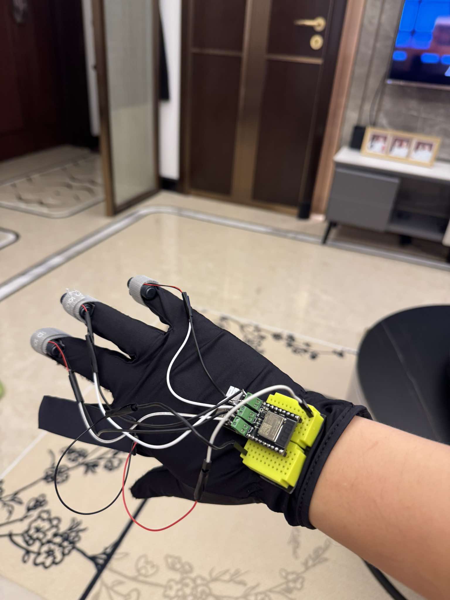 Right-hand glove with ESP32 wrist board and fingertip sensors